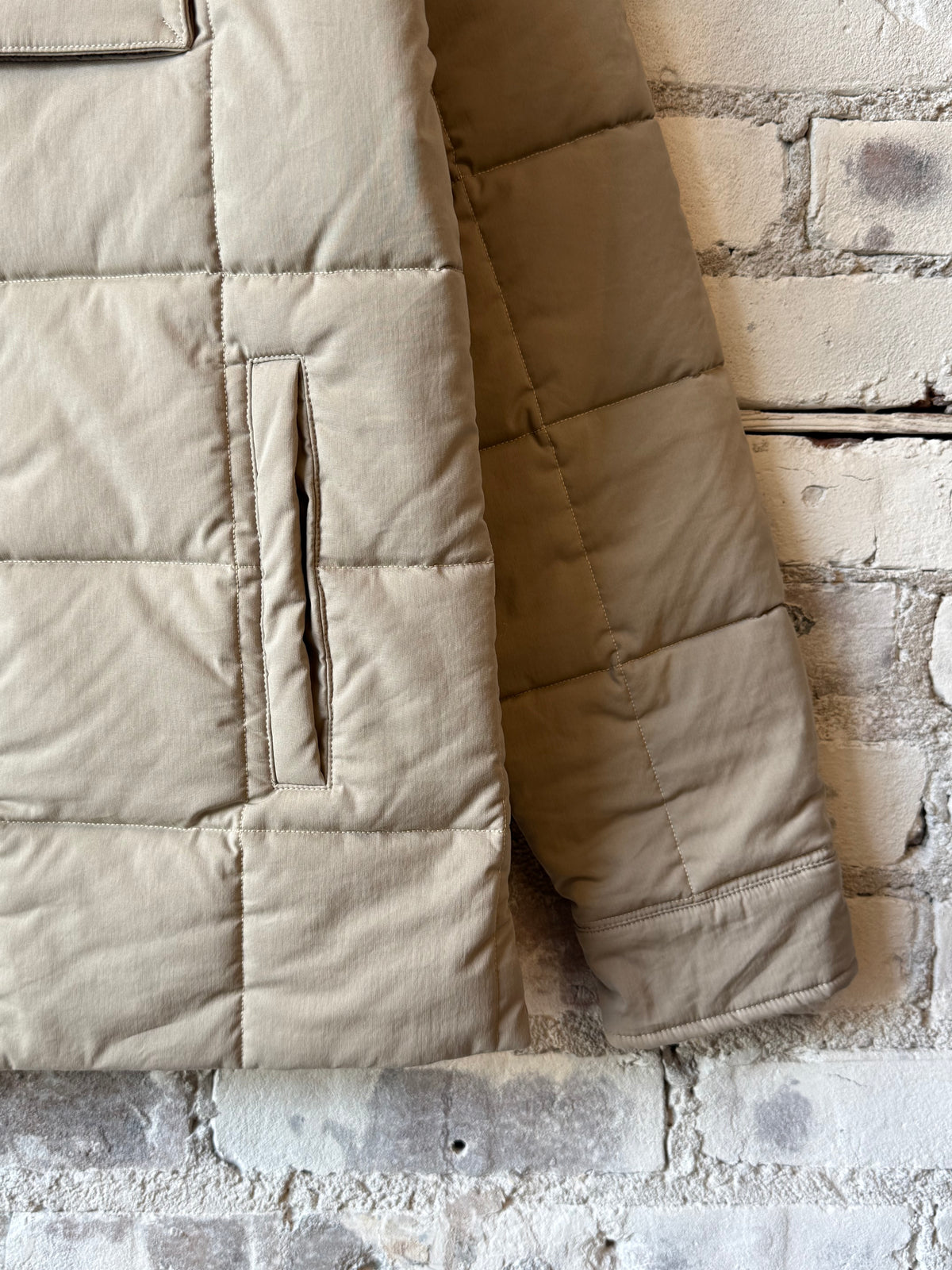 Men's padded quilted overshirt in colonial beige by Aspesi, featuring a quilted design and padded for warmth.