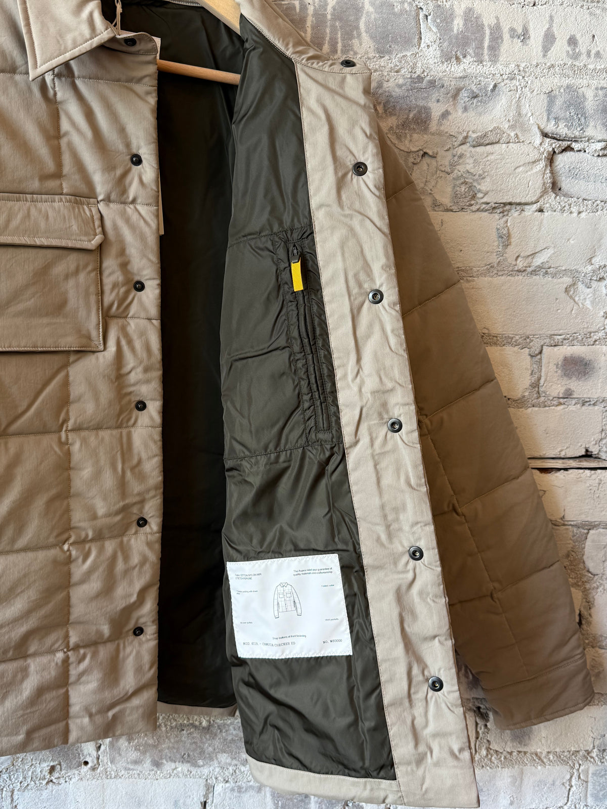 Men's padded quilted overshirt in colonial beige by Aspesi, featuring a soft, insulated design with a quilted pattern.