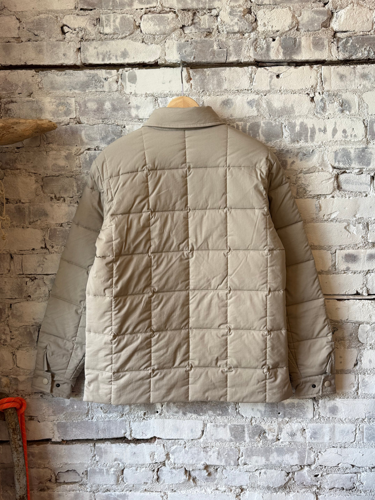 Men's padded quilted overshirt in colonial beige by Aspesi, featuring a padded, quilted design and casual overshirt style.