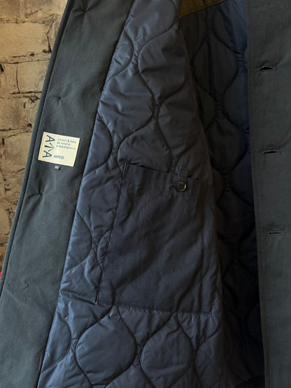 Men's Pascal wool and cashmere coat in black navy, Aspesi, displayed on a hanger showing its sleek, tailored design.