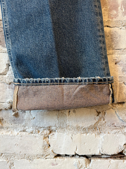 Closed Women's Gillan Comfort Wide Jean in mid blue, showcasing a relaxed fit with wide legs and classic denim details.
