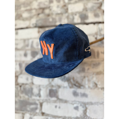Black NY M CITI SERIES snapback hat by The Ampal Creative with flat brim and embroidered NYC logo, accessories for casual style.