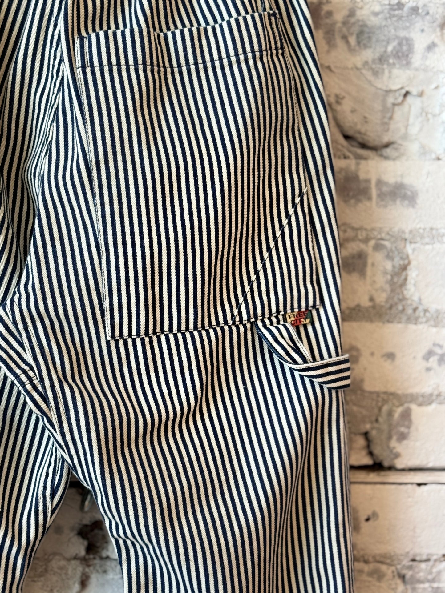 Women's Freecity Indigo Stripe French Sailors Pants with classic navy and white stripe design, relaxed fit, and high waist.