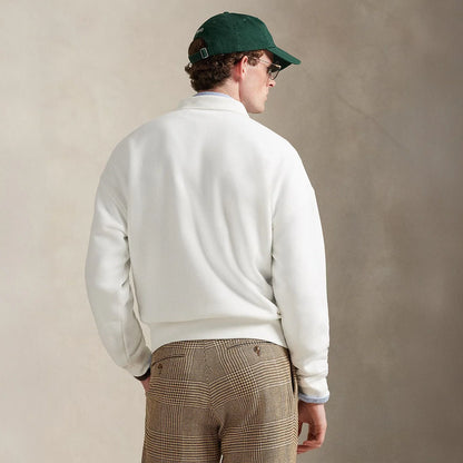 Men's white Polo Ralph Lauren Island Fleece graphic print polo sweatshirt showing relaxed fit and detailed graphic design.