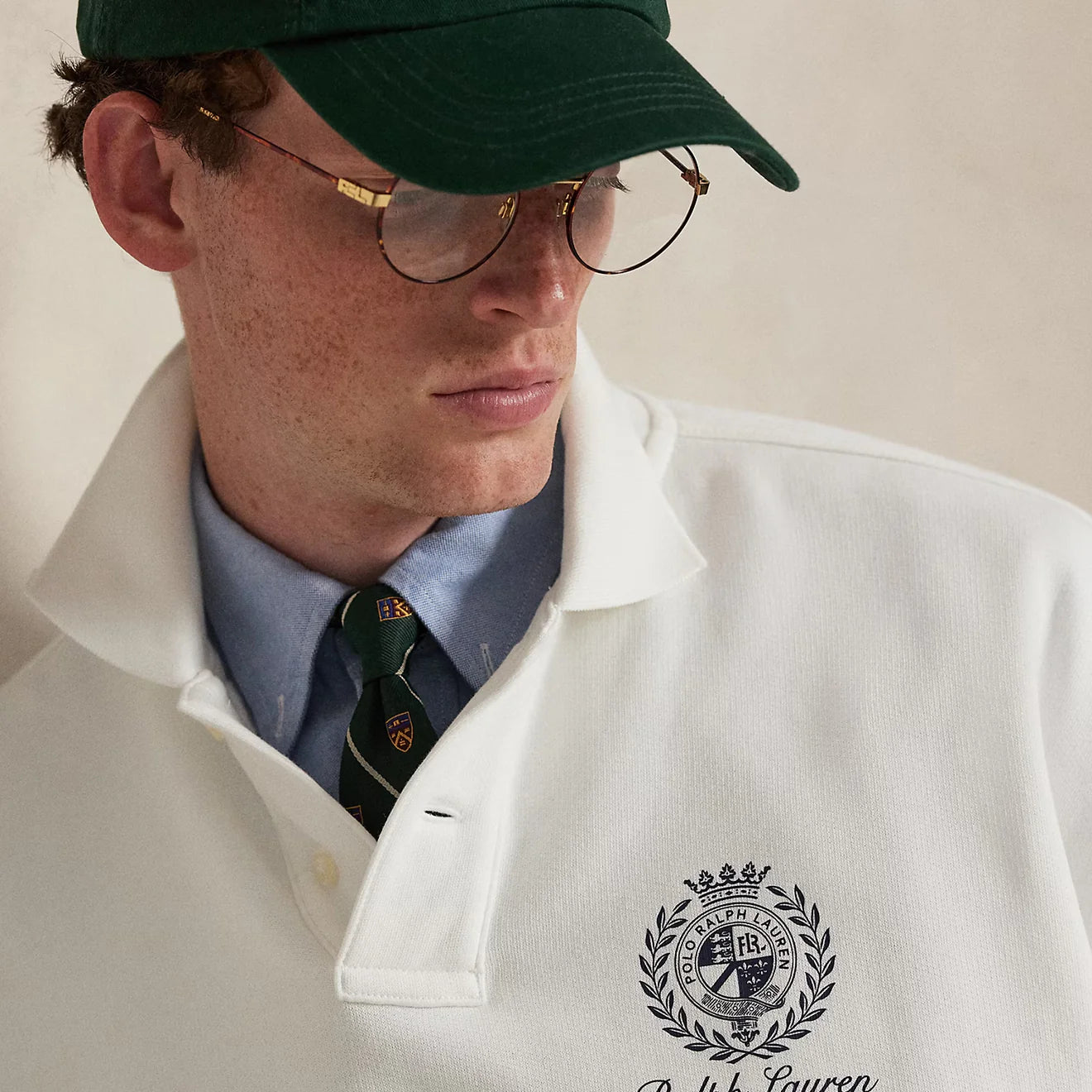 Men's white Polo Ralph Lauren Island Fleece graphic print polo sweatshirt with relaxed fit and ribbed cuffs.