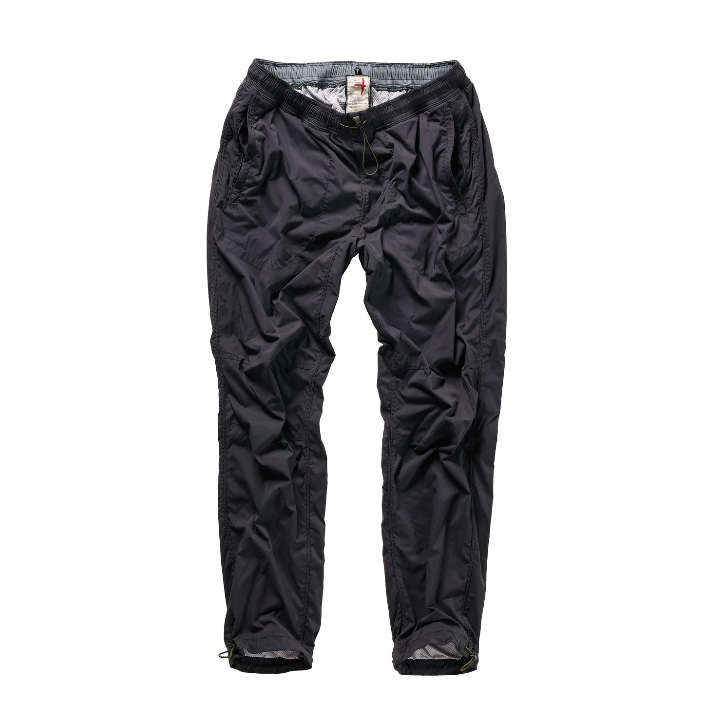 Men's black fade Off-Trail Windpant by Relwen, lightweight outdoor pants with a relaxed fit and wind-resistant fabric.