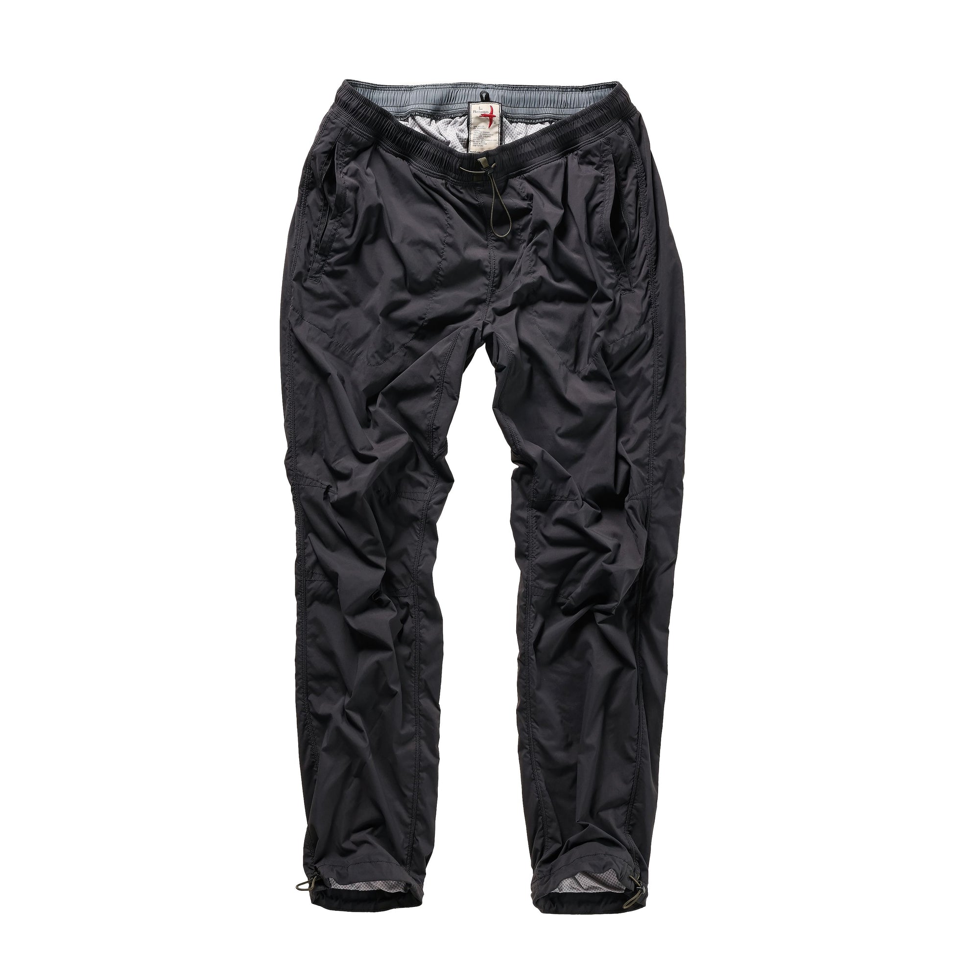 Men's black fade Off-Trail Windpant by Relwen, lightweight outdoor pants with a relaxed fit and wind-resistant fabric.