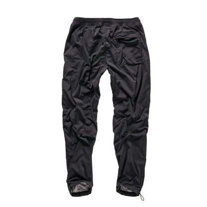 Men's Off-Trail Windpant by Relwen in black fade, showcasing lightweight, wind-resistant fabric with a relaxed fit for outdoor activities.