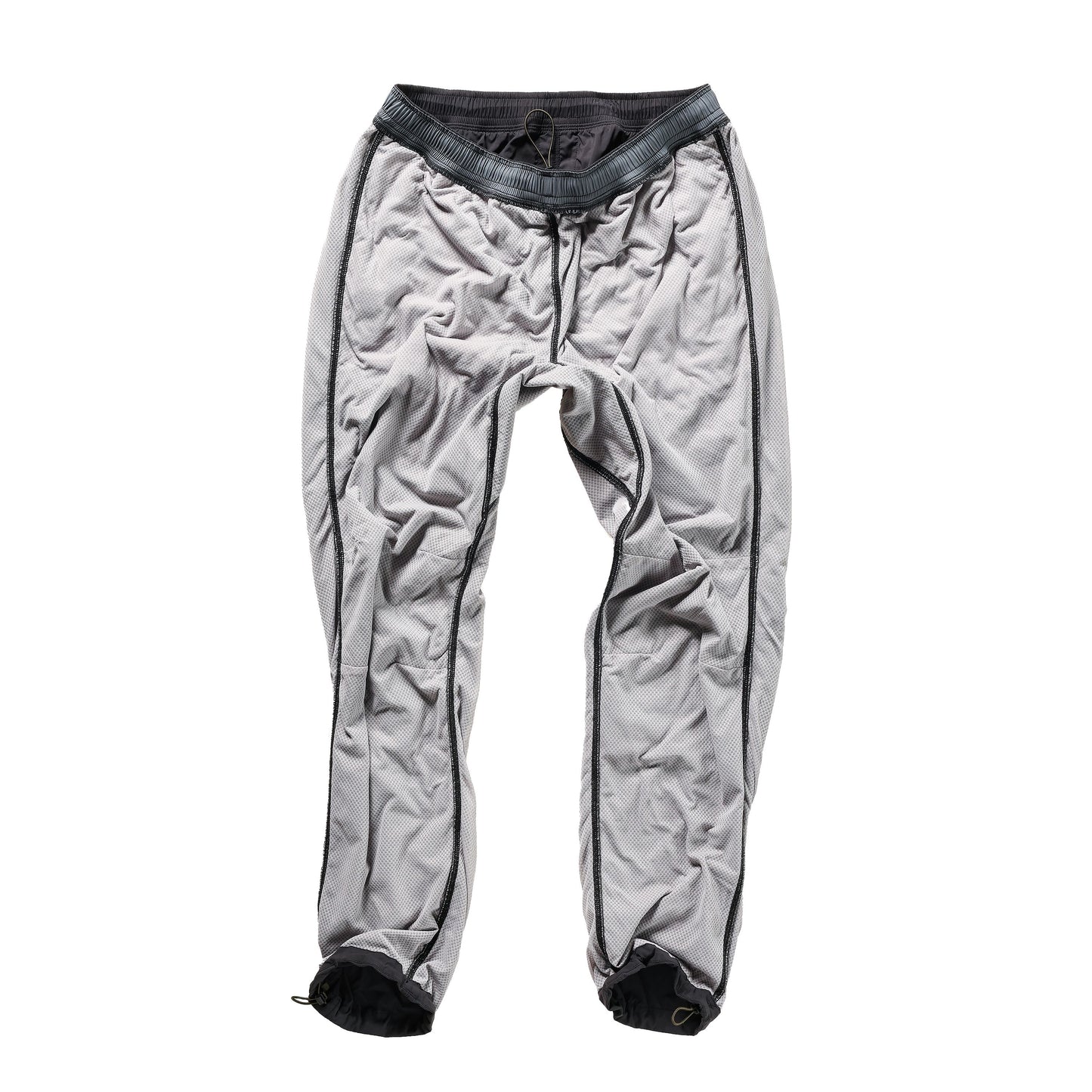 Men's black fade Off-Trail Windpant by Relwen, shown in a relaxed fit with adjustable waistband and tapered leg design.