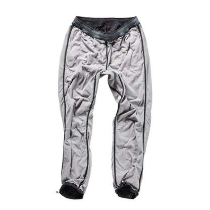Men's black fade Off-Trail Windpant by Relwen, shown in a relaxed fit with adjustable waistband and tapered leg design.