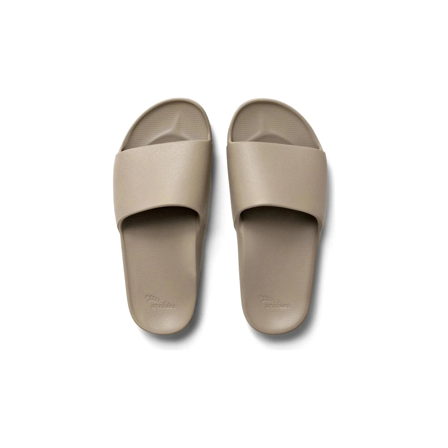 Taupe Archies M6/W7 footwear showing stylish, comfortable slip-on shoes with smooth finish and subtle design details.