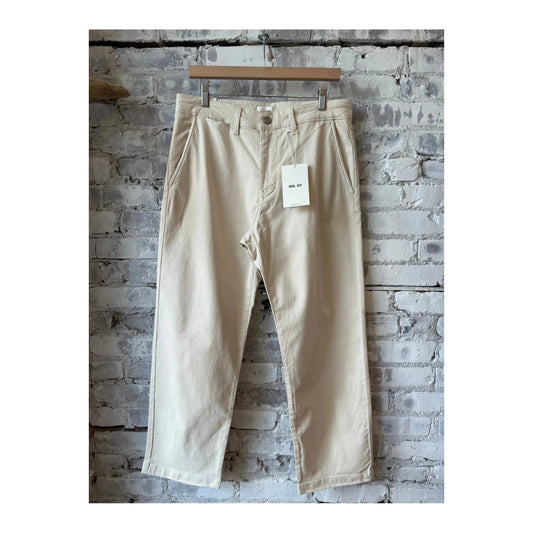 Men's NN07 Aden regular fit ivory chino pants, shown hanging on a hanger with a clean, neutral background.