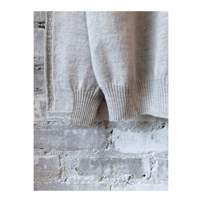 Light gray women's Airy Wool crewneck sweater by Pas De Calais, showing the soft, cozy knit fabric and classic fit.