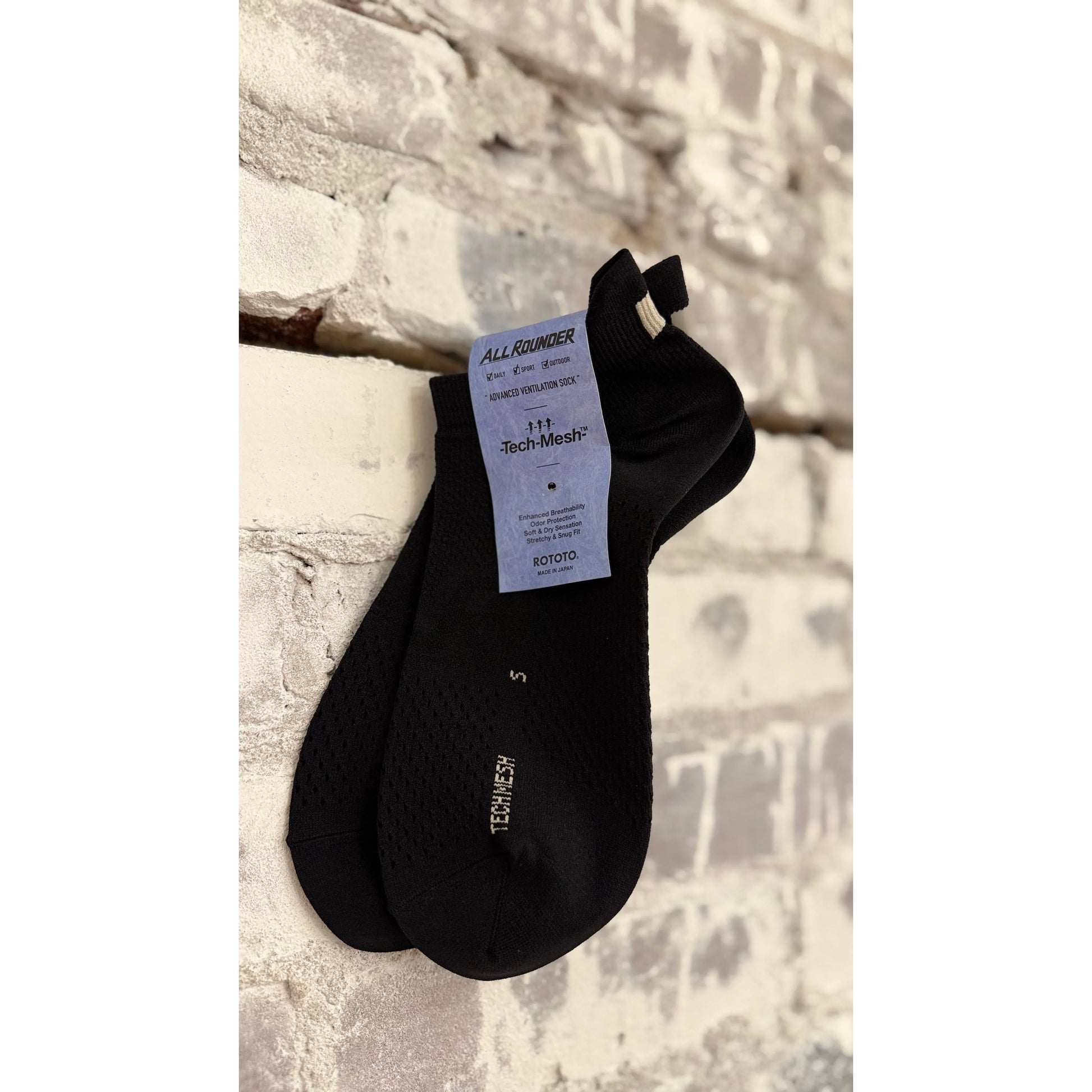 Men's black All-Rounder Tech Mesh ankle socks by Rototo, featuring breathable mesh fabric and comfortable fit.
