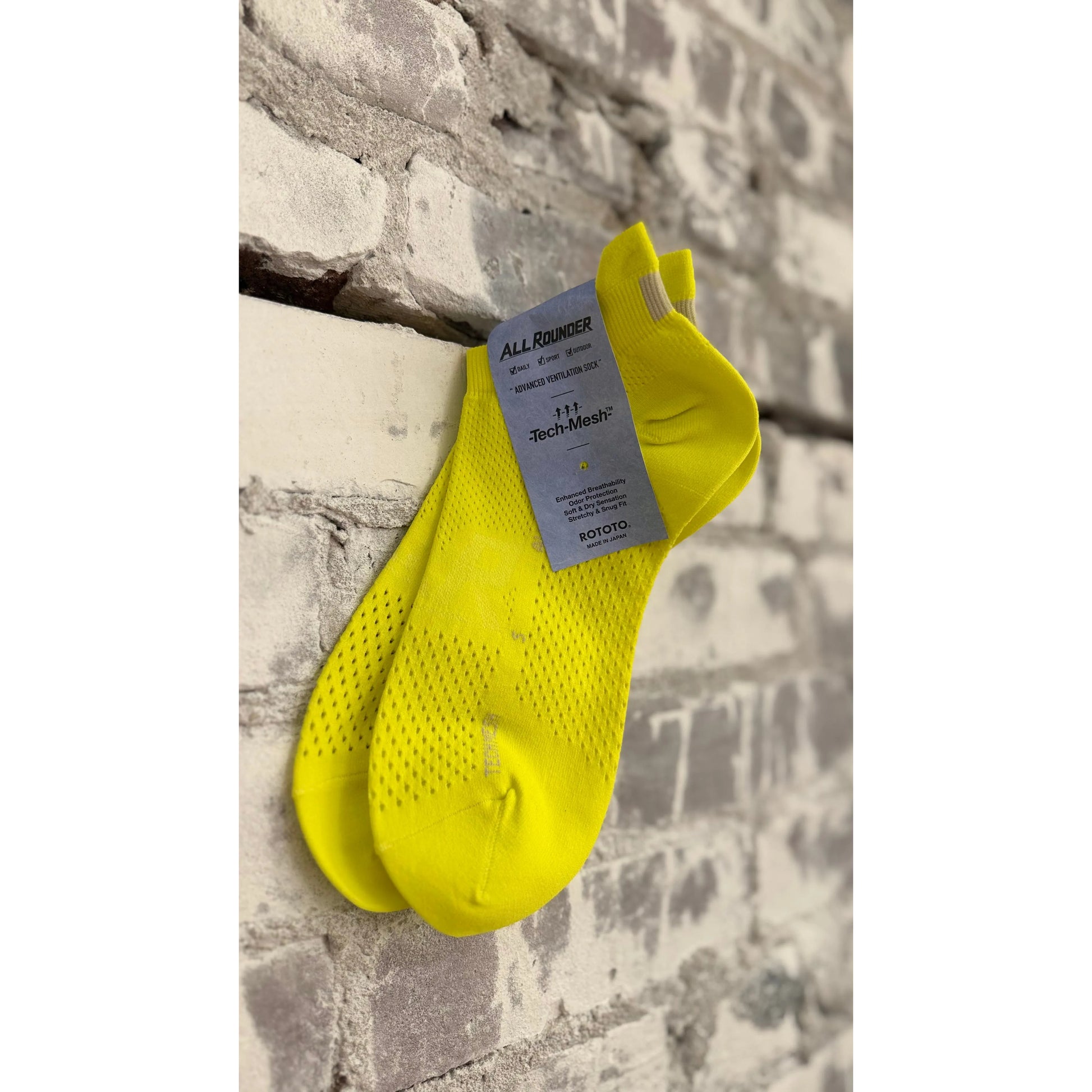 Men's All-Rounder Tech Mesh Ankle Socks by Rototo in lemon lime color, featuring breathable mesh fabric and comfortable fit.
