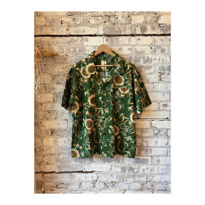Men's green Aloha shirt with Casa print by Eat Dust, featuring vibrant tropical design and casual fit.