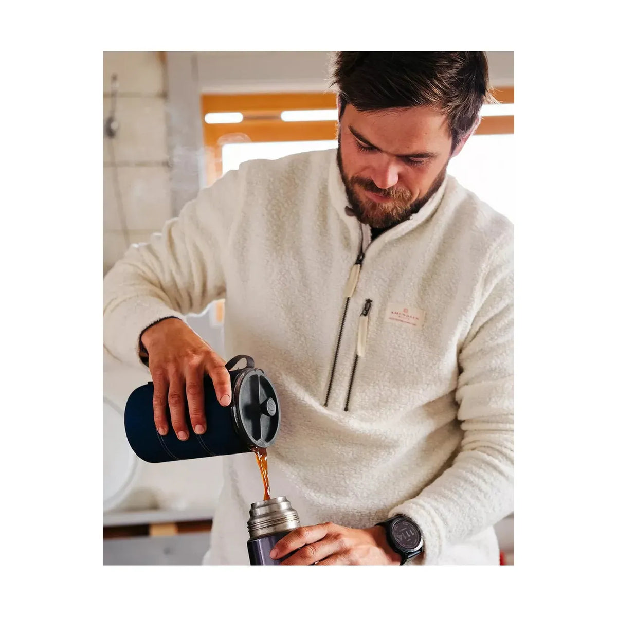 Men's Amundsen Hut Half Zip in oatmeal, showcasing the soft, comfortable fleece fabric and half-zip collar for casual outdoor style.