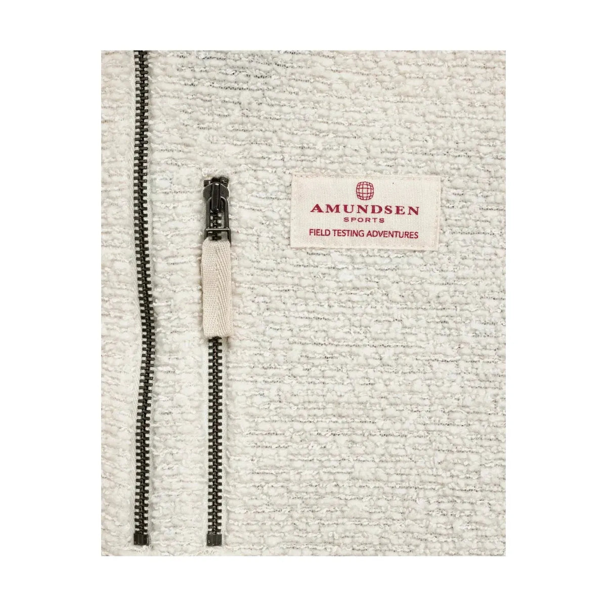 Men's Amundsen Hut Half Zip in oatmeal, showing the soft fabric and half-zip design on a flat-lay background.