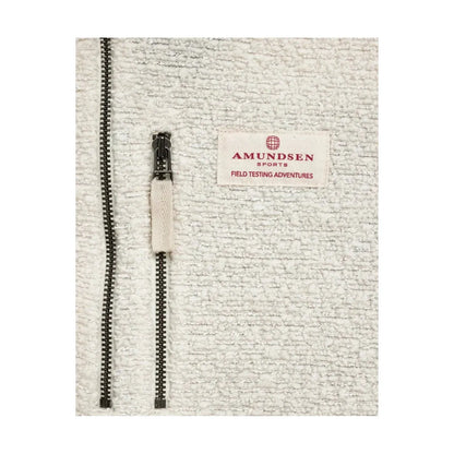 Men's Amundsen Hut Half Zip in oatmeal, showing the soft fabric and half-zip design on a flat-lay background.