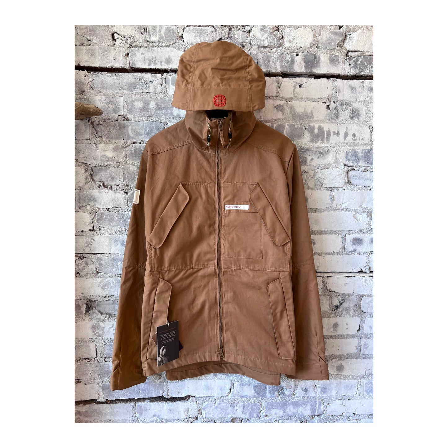 Men's Amundsen Vidda Jacket in camel color, showcasing durable outdoor jacket with adjustable features and rugged style.