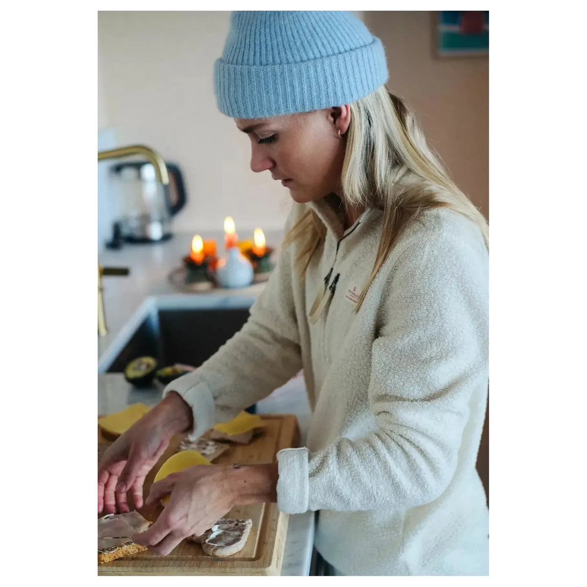Women's Amundsen Hut Half Zip in oatmeal, showing the cozy fleece material and half-zip neckline on a light background.