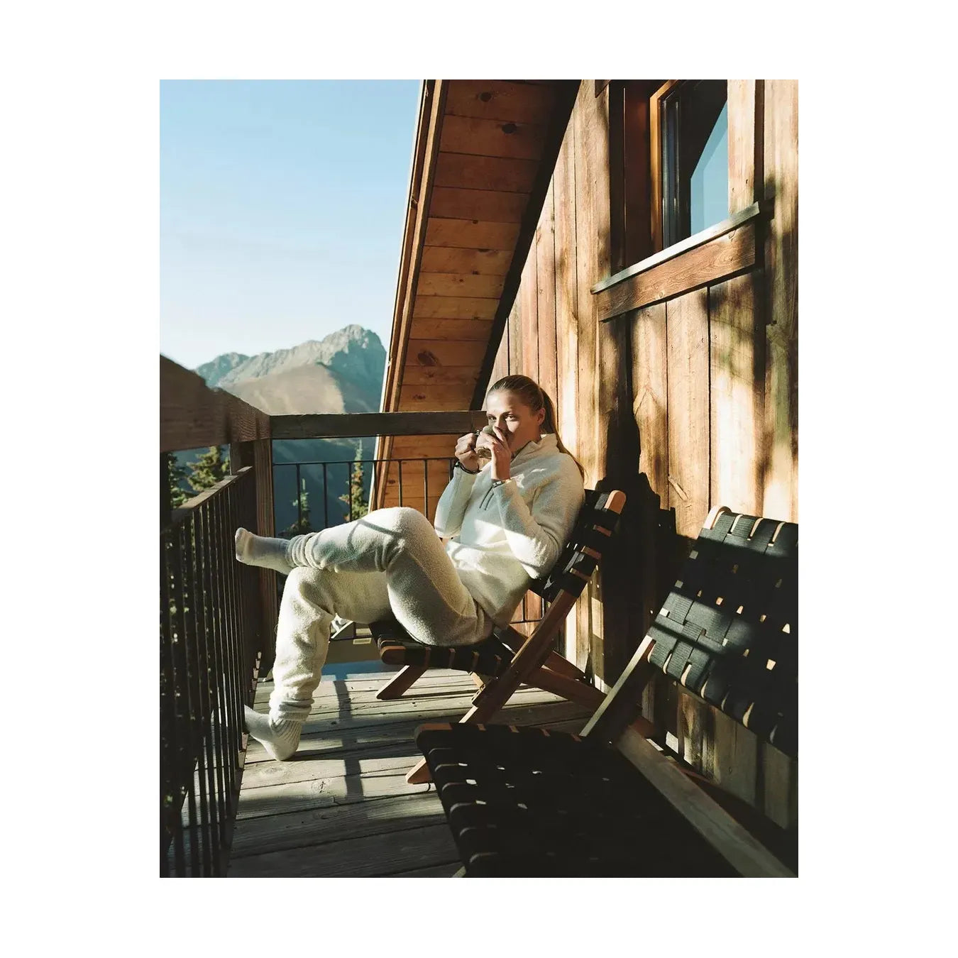 Women's Amundsen Hut Pant in faded navy, relaxed fit with white accents, made for comfortable outdoor wear.