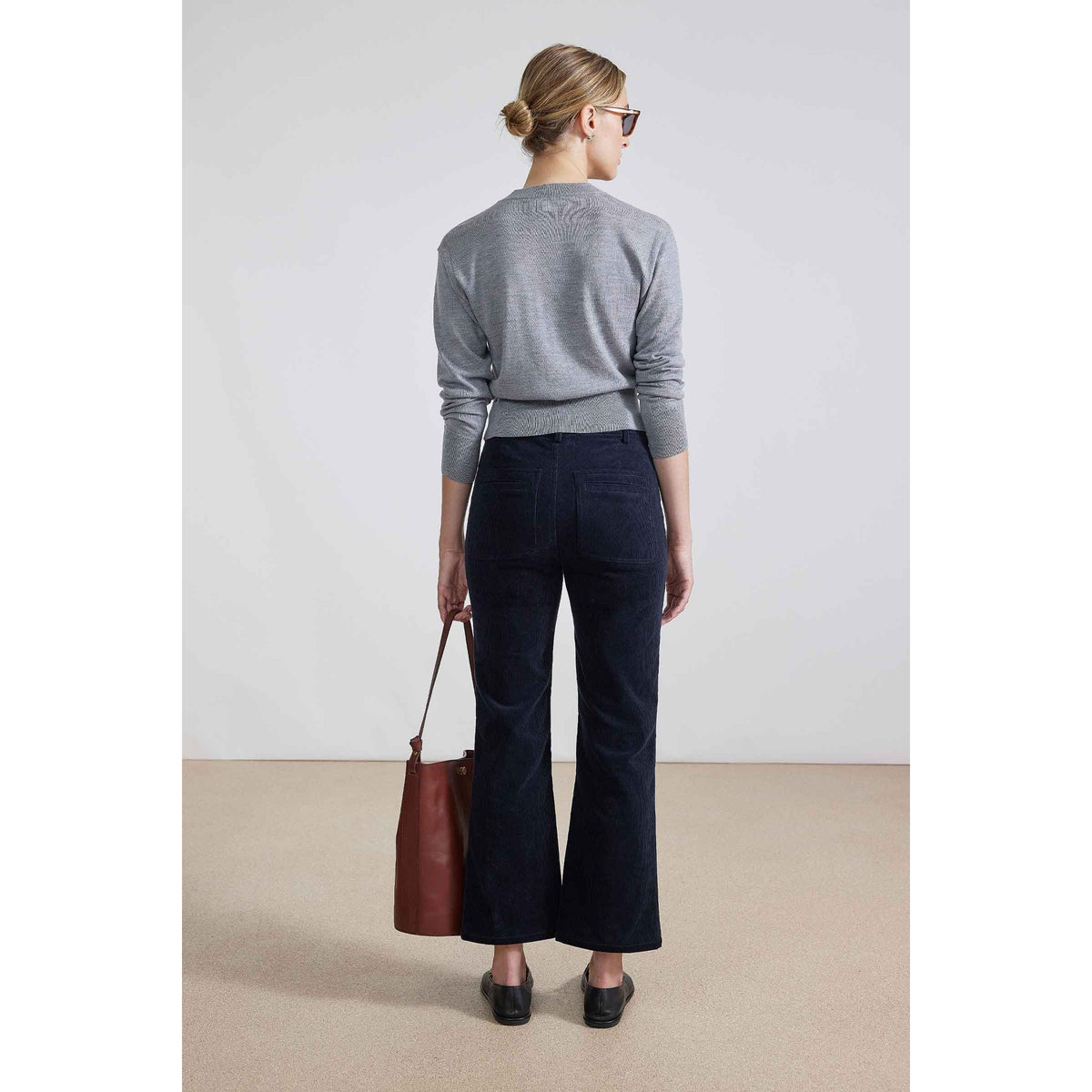 Women's Marston Slim Corduroy Pant by Apiece Apart in midnight blue, featuring a tailored fit and classic corduroy texture.