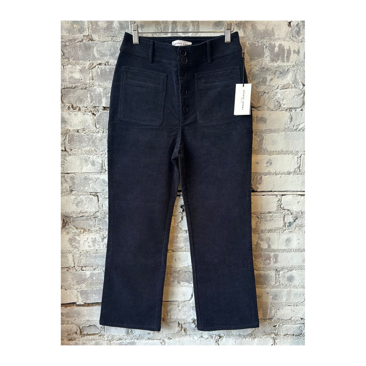 Women's Apiece Apart Marston Slim Corduroy Pant in Midnight, showcasing the fitted style and soft corduroy fabric.