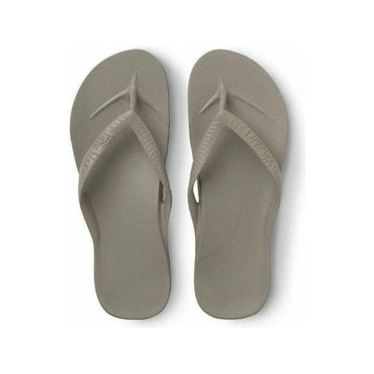 Archies taupe flip-flops with arch support, featuring comfortable footwear design and casual style for everyday wear.