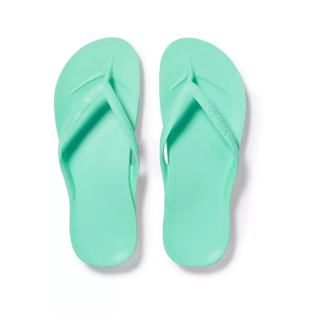 Mint Archies M6/W7 footwear with arch support flip-flops featuring cushioned soles and comfortable straps.
