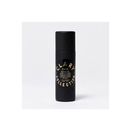 Clary Collection avocado balm stick in a small, portable container with a clear label and a smooth, rounded balm surface.
