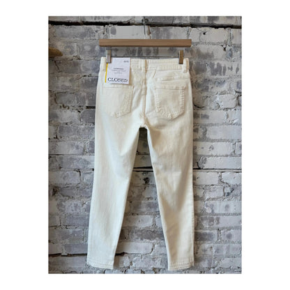 Close-up of Closed Women's Baker Power Stretch Skinny Jeans in ivory, showcasing the fitted style and soft denim fabric.