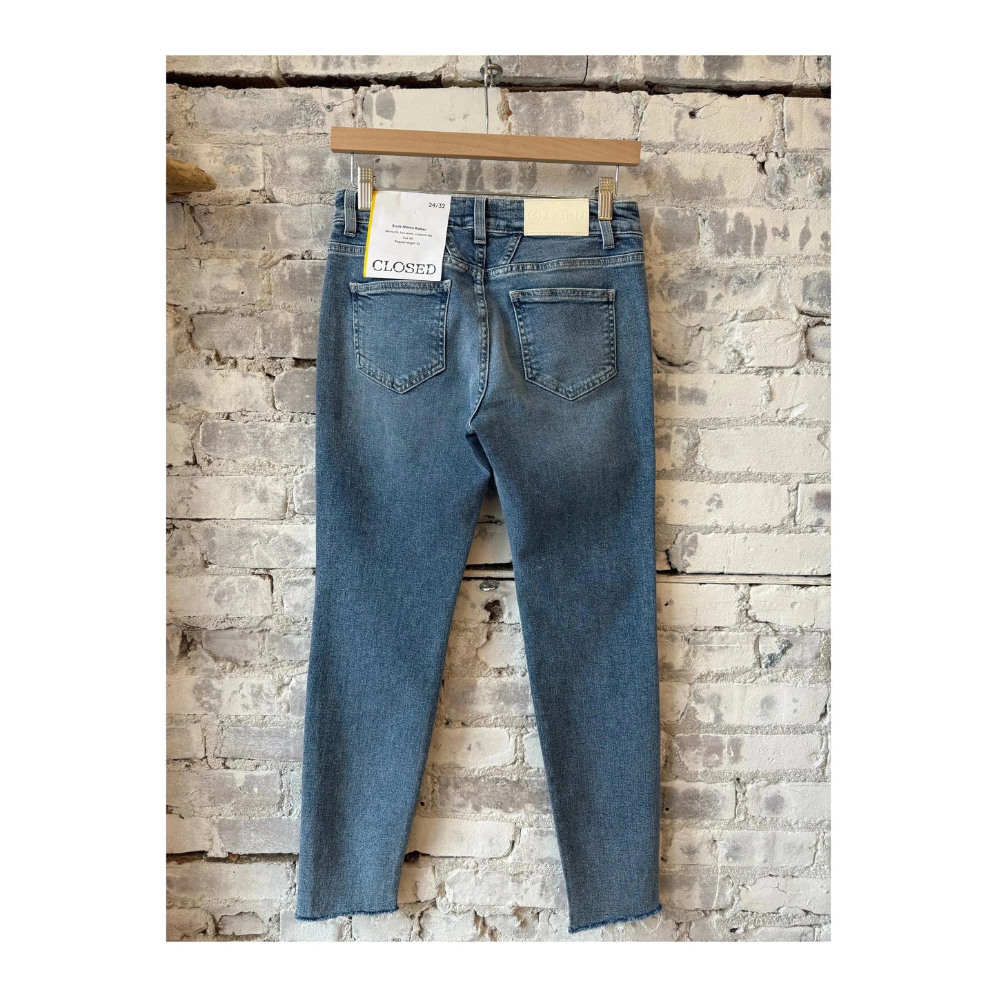 Women's Baker Stretch Skinny Jean in mid blue by Closed, showing the fitted denim with classic five-pocket design and mid-rise waist.