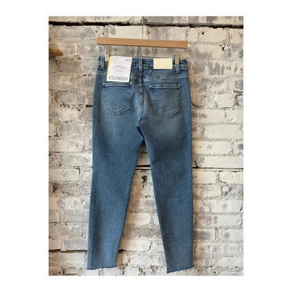 Women's Baker Stretch Skinny Jean in mid blue by Closed, showing the fitted denim with classic five-pocket design and mid-rise waist.