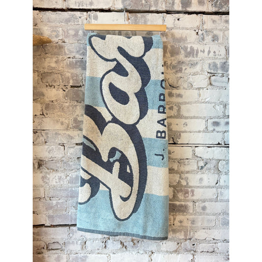 Men's Barbour Archive Beach Towel with classic patterned design, soft fabric, and branded logo for seaside or poolside use.