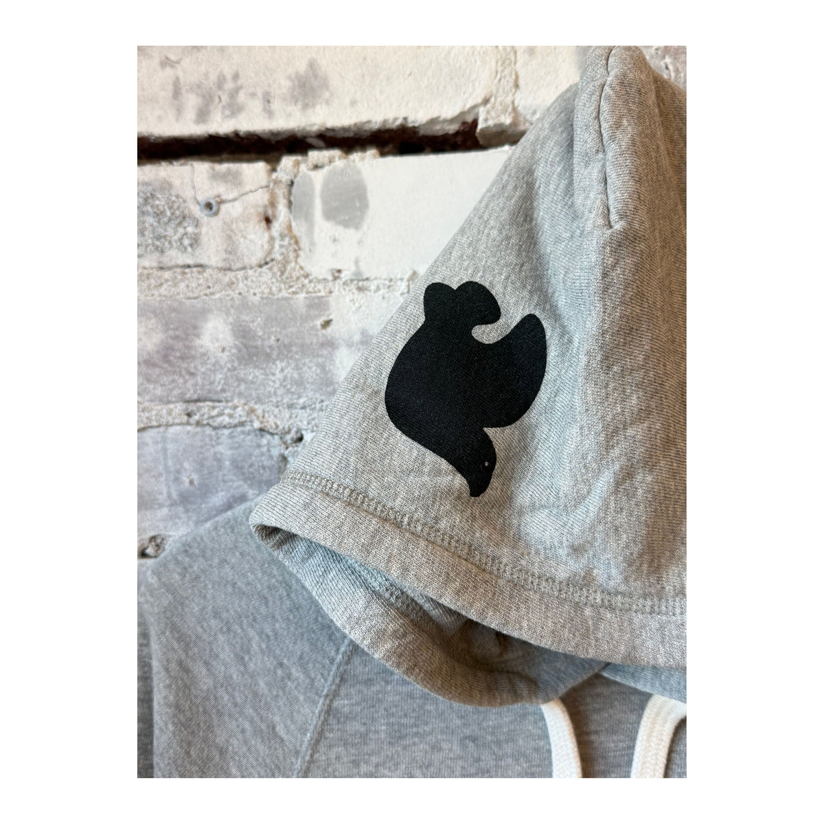 Women's Freecity BASICGOODNESS Light-Terry/Fluff Hoodie in heathered fabric, shown in a relaxed fit with a hood and casual style.