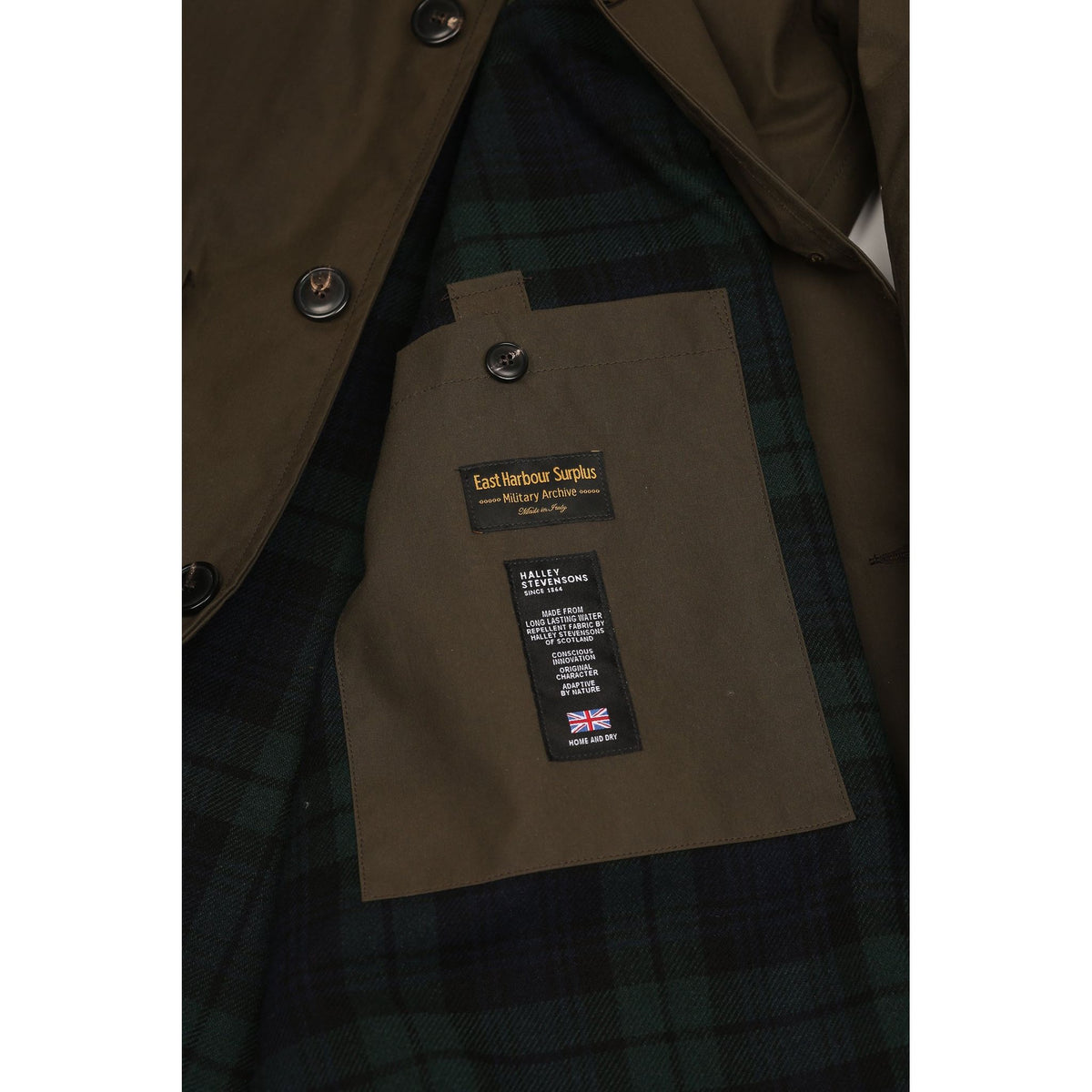 Men's green Baxter waxed cotton trench coat by East Harbour Surplus, featuring classic design and durable waterproof fabric.