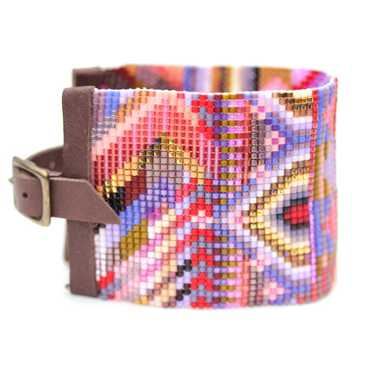 Julie Rofman Bermuda cuff accessory with intricate metal design and open cuff style for stylish wrist wear.
