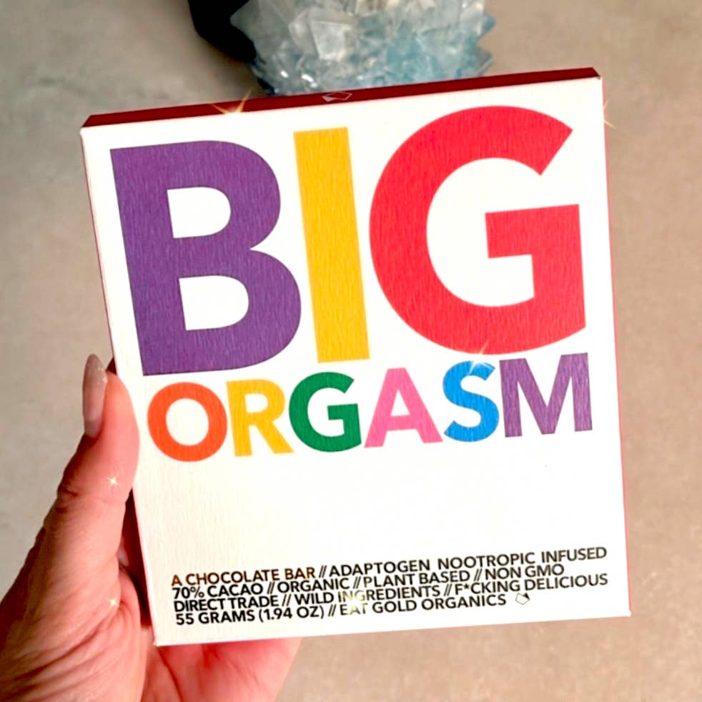 Eat Gold Organics BIG ORGASM chocolate bar accessory with rich, delicious chocolate and functional ingredients in a sleek package.