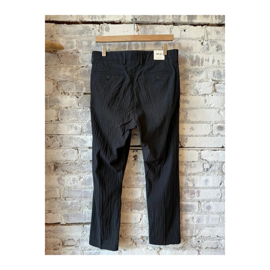 Men's black Bill Seersucker trousers by NN07, featuring a stylish seersucker fabric and classic fit for casual or smart occasions.