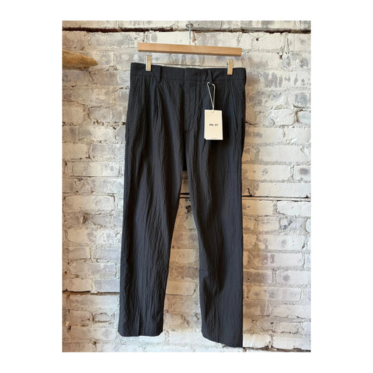 Men's black Bill Seersucker trousers by NN07, featuring lightweight, textured fabric and tailored fit for a stylish look.