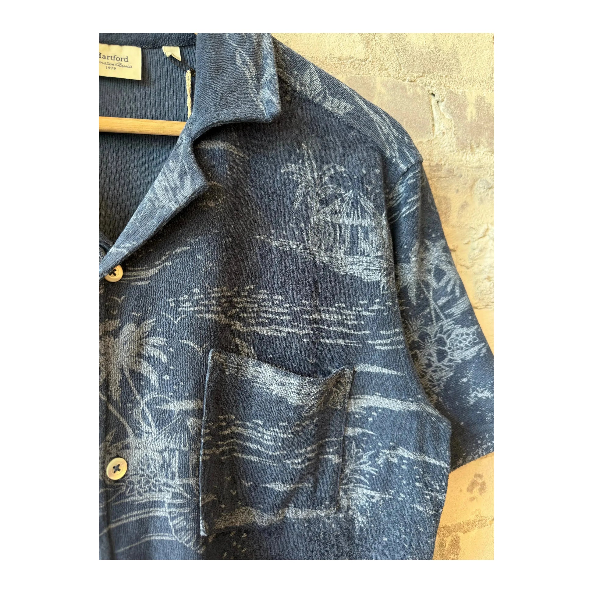 Men's Hartford Bouclette Knit Polo in cobalt, showcasing the textured fabric, classic collar, and button-front design.