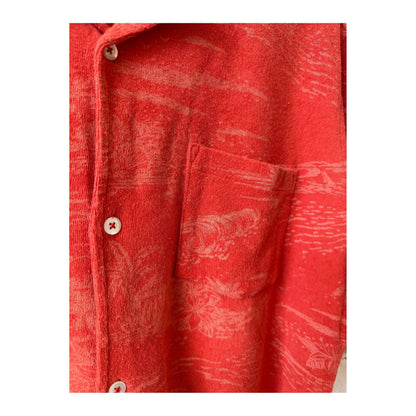 Men's Hartford Bouclette Knit Polo in terracotta, close-up of the textured knit fabric and classic polo collar.