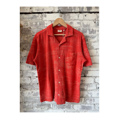 Men's terracotta Bouclette Knit Polo shirt by Hartford Men's, featuring textured knit fabric and classic polo collar.