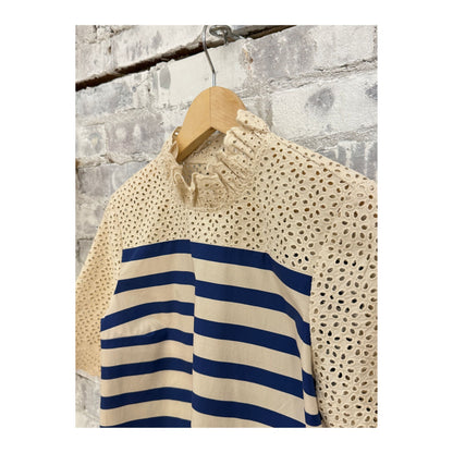 Women's Breton stripe blouse by Hope For Flowers featuring classic navy and white horizontal stripes.