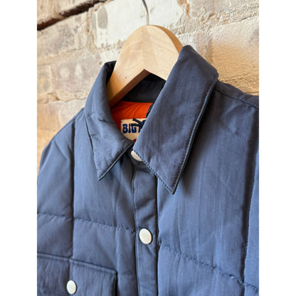 Men's Bridalveil Jacket in Blackberry by Big Rock Candy Mountaineering, shown in a close-up image highlighting the jacket's fabric and design.