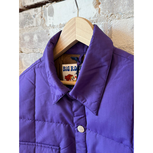 Men's Bridalveil Jacket in Grape from Big Rock Candy Mountaineering, showing the waterproof outdoor jacket with a hood and zip closure.