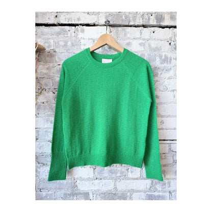 Women's Brighton Pullover in Tanager by M.Patmos, featuring a cozy knit fabric and relaxed fit, displayed on a model.