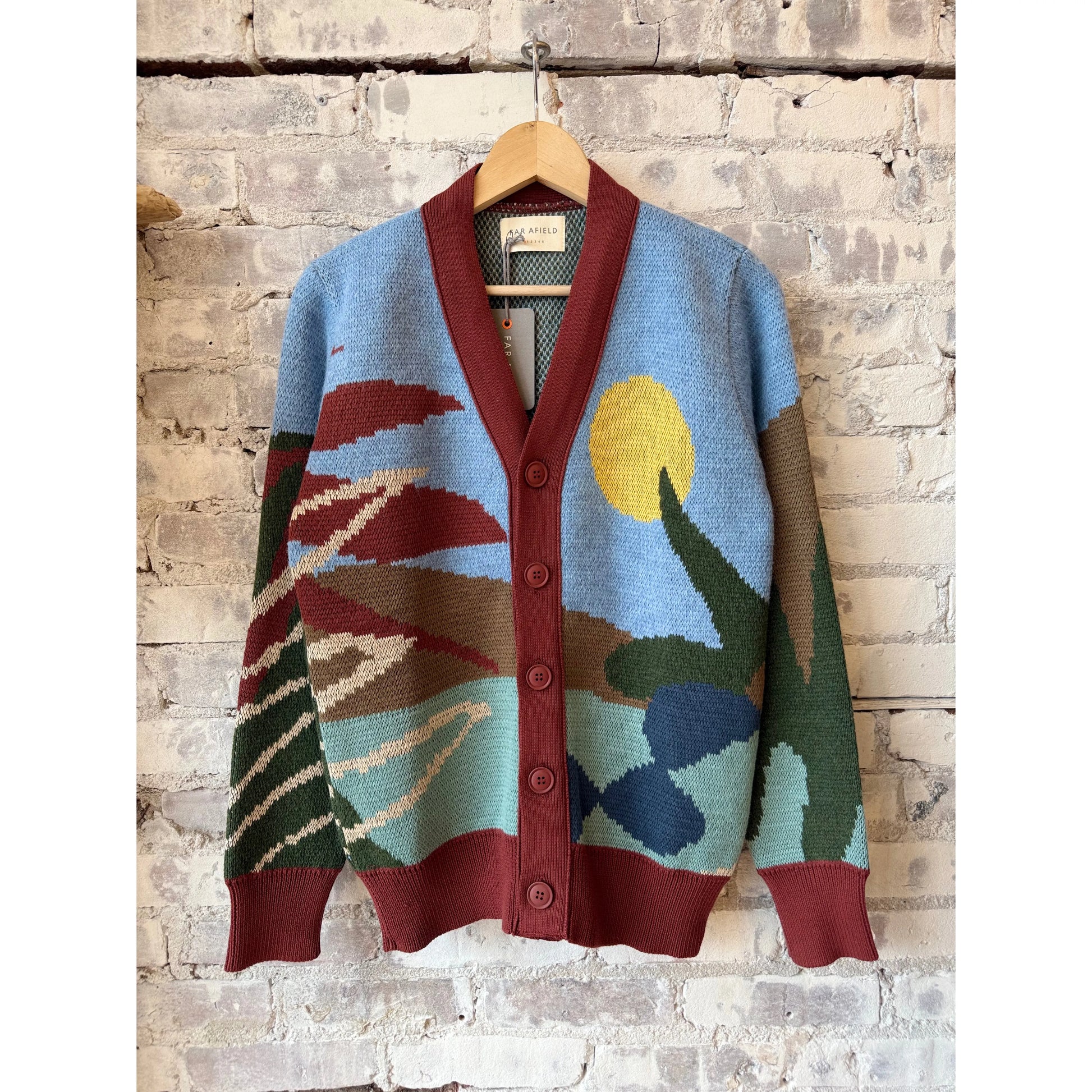 Men's Buckley Cardigan by Far Afield featuring a beach landscape pattern, cozy knit sweater with seaside-inspired design.