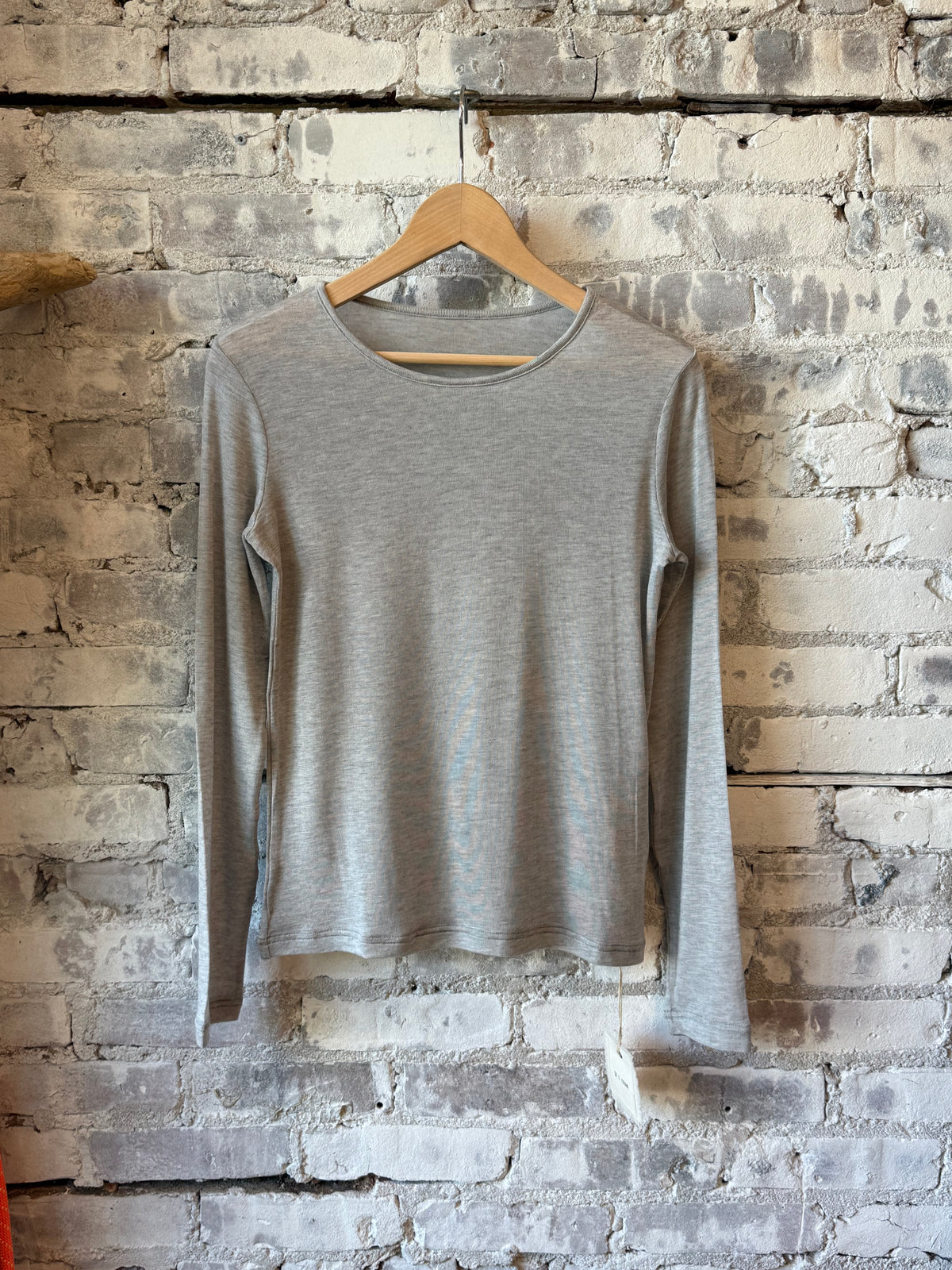 Women's grey cashmere silk jersey long-sleeve crew neck top by V::Room, soft and luxurious fabric perfect for casual or elegant wear.